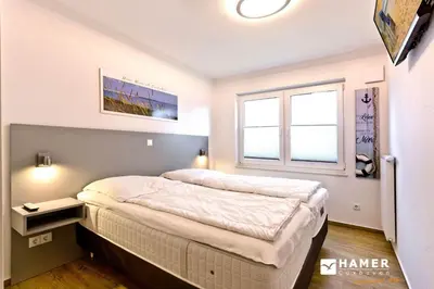 Ein Bett oder Betten in einem Zimmer der Unterkunft Admiralsgarten, AG2s