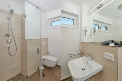 Ein Badezimmer in der Unterkunft Nordstrand, N202a