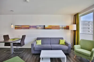 Ein Sitzbereich in der Unterkunft Duhner Strandhus, S208