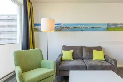 Ein Sitzbereich in der Unterkunft Duhner Strandhus, S210