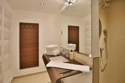 Ein Badezimmer in der Unterkunft Duhner Strandhus, S8