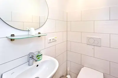 Ein Badezimmer in der Unterkunft Rugenbarg, RR6