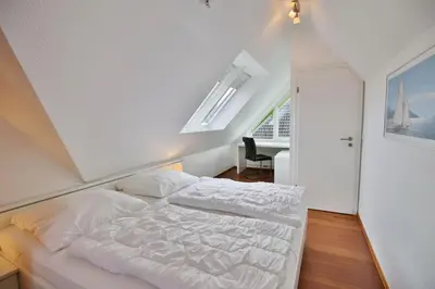 Ein Bett oder Betten in einem Zimmer der Unterkunft Bernstein, BS6