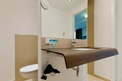 Ein Badezimmer in der Unterkunft Duhner Strandhus, S301