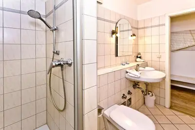 Ein Badezimmer in der Unterkunft Seeterrassen, ST17