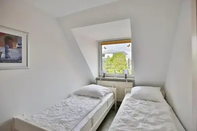 Ein Bett oder Betten in einem Zimmer der Unterkunft Stranddüne, D20