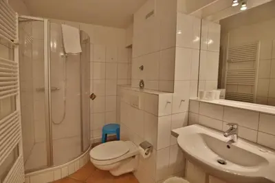 Ein Badezimmer in der Unterkunft Hohe Worth, H312