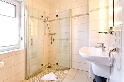 Ein Badezimmer in der Unterkunft Ruge Bries, RB3