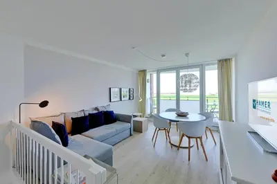 Ein Sitzbereich in der Unterkunft Nordseeblick, NB2