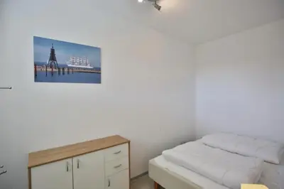 Ein Bett oder Betten in einem Zimmer der Unterkunft Höpckestraße, HS11