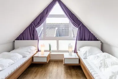 Ein Bett oder Betten in einem Zimmer der Unterkunft Dunamar, DM8