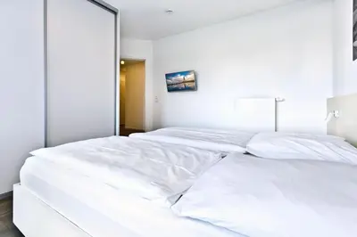 Ein Bett oder Betten in einem Zimmer der Unterkunft Alte Liebe, RA306