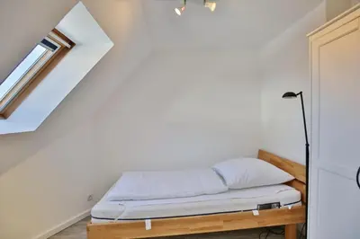 Ein Bett oder Betten in einem Zimmer der Unterkunft Seemöwe, SM14