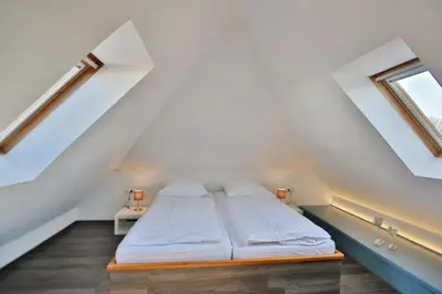 Ein Bett oder Betten in einem Zimmer der Unterkunft Seemöwe, SM14