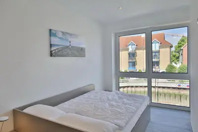 Ein Bett oder Betten in einem Zimmer der Unterkunft City Marina, CM20