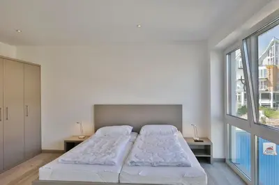 Ein Bett oder Betten in einem Zimmer der Unterkunft City Marina, CM20