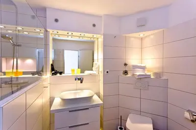 Ein Badezimmer in der Unterkunft Hohe Worth, H205