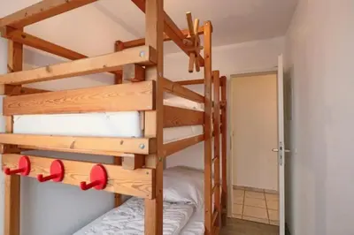 Ein Bett oder Betten in einem Zimmer der Unterkunft Stranddüne, D1