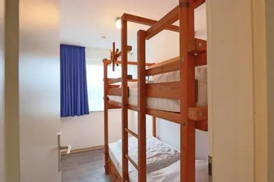 Ein Bett oder Betten in einem Zimmer der Unterkunft Stranddüne, D1