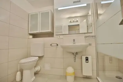 Ein Badezimmer in der Unterkunft Hohe Worth, H306