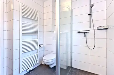 Ein Badezimmer in der Unterkunft Ruge Bries, RB10