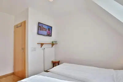 Ein Bett oder Betten in einem Zimmer der Unterkunft Am Seedeich 14, AS6