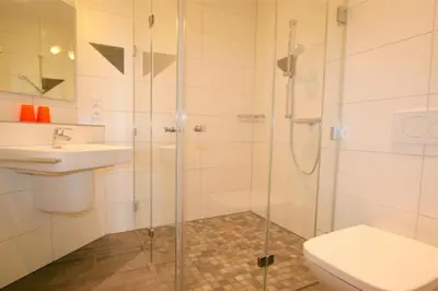 Ein Badezimmer in der Unterkunft Admiralsgarten, AG15b