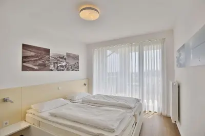 Ein Bett oder Betten in einem Zimmer der Unterkunft Alte Liebe, RA103