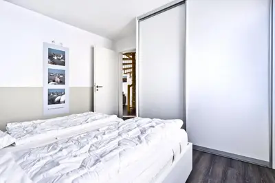 Ein Bett oder Betten in einem Zimmer der Unterkunft Duhner Brandung, B7