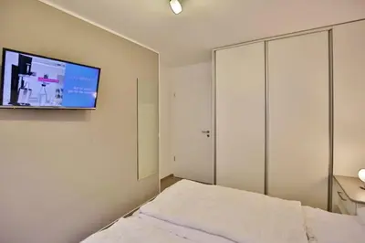 Ein Bett oder Betten in einem Zimmer der Unterkunft Admiralsgarten, AG6b