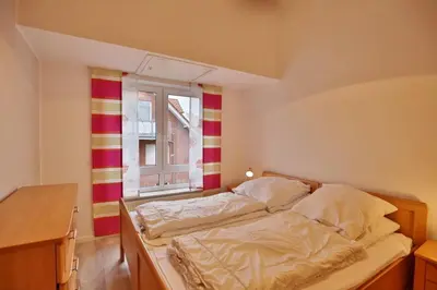 Ein Bett oder Betten in einem Zimmer der Unterkunft Aquaris, AQ8