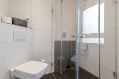 Ein Badezimmer in der Unterkunft Admiralsgarten, AG1b