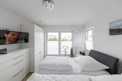 Ein Bett oder Betten in einem Zimmer der Unterkunft Admiralsgarten, AG1b