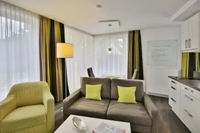 Ein Sitzbereich in der Unterkunft Duhner Strandhus, S2