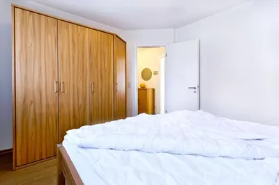 Ein Bett oder Betten in einem Zimmer der Unterkunft Ruge Bries, RB6
