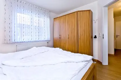 Ein Bett oder Betten in einem Zimmer der Unterkunft Ruge Bries, RB6