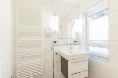 Ein Badezimmer in der Unterkunft Admiralsgarten, AG6s