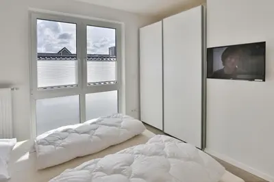 Ein Bett oder Betten in einem Zimmer der Unterkunft Meine See, MS9