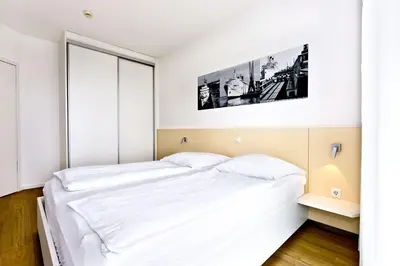 Ein Bett oder Betten in einem Zimmer der Unterkunft Alte Liebe, RA203