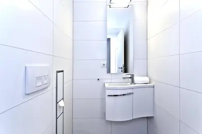 Ein Badezimmer in der Unterkunft Alte Liebe, RA101