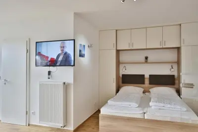Ein Bett oder Betten in einem Zimmer der Unterkunft Rugenbarg, RR16