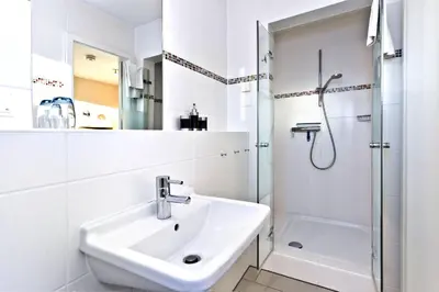 Ein Badezimmer in der Unterkunft Residenz am Yachthafen, RY15