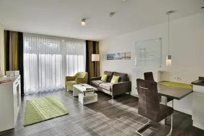 Ein Sitzbereich in der Unterkunft Duhner Strandhus, S13