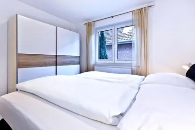 Ein Bett oder Betten in einem Zimmer der Unterkunft Ruge Bries, RB1