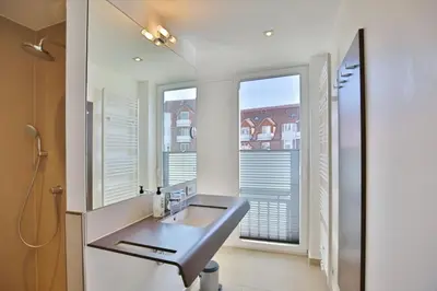Ein Badezimmer in der Unterkunft Duhner Strandhus, S113