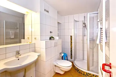 Ein Badezimmer in der Unterkunft Hohe Worth, H213
