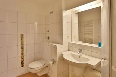 Ein Badezimmer in der Unterkunft Hohe Worth, H208