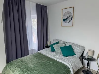 Ein Bett oder Betten in einem Zimmer der Unterkunft Apartments Brunsbüttel