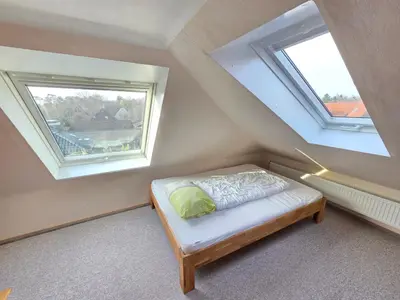 Ein Bett oder Betten in einem Zimmer der Unterkunft Hamburger Straße 20 Wohnung 11 Lichtanker