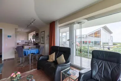 Ein Sitzbereich in der Unterkunft Strandpalais, Whg 1